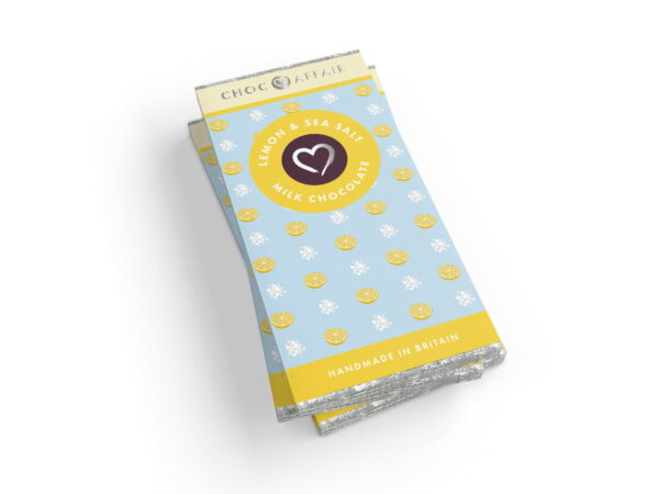 A stack of lemon & sea salt chocolate bars on a white background