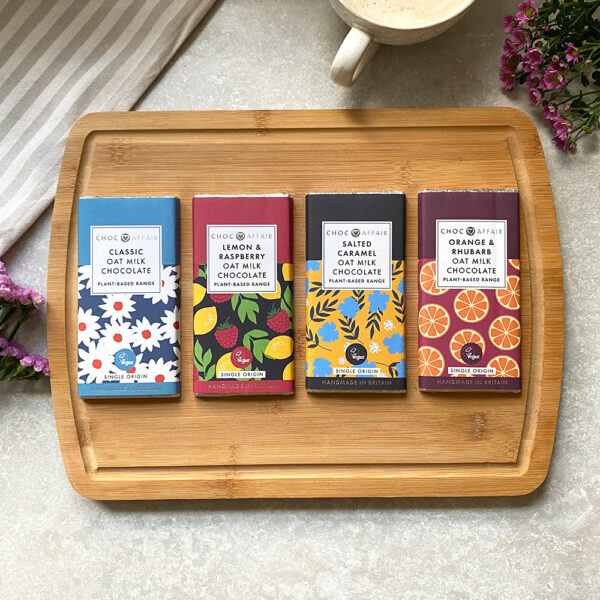Oat milk chocolate bars. The bars flavours include classic oat milk, salted caramel, lemon & raspberry and orange & rhubarb full view