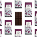 Multiple classic dark chocolate bars arranged on a white background