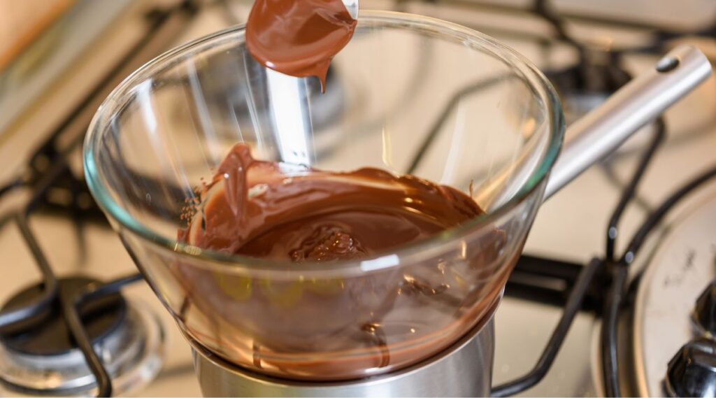 Melt chocolate by double boiler