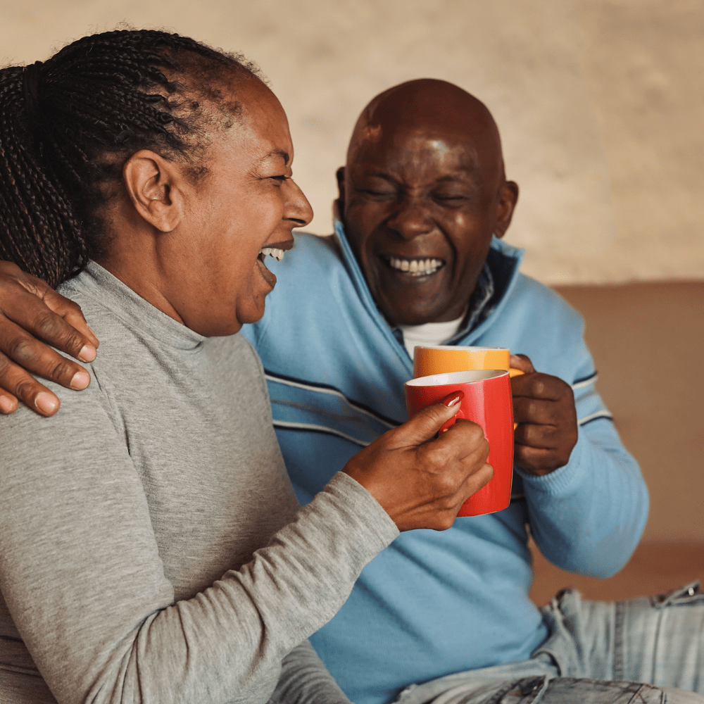 A man and a woman drinking hot chocolate