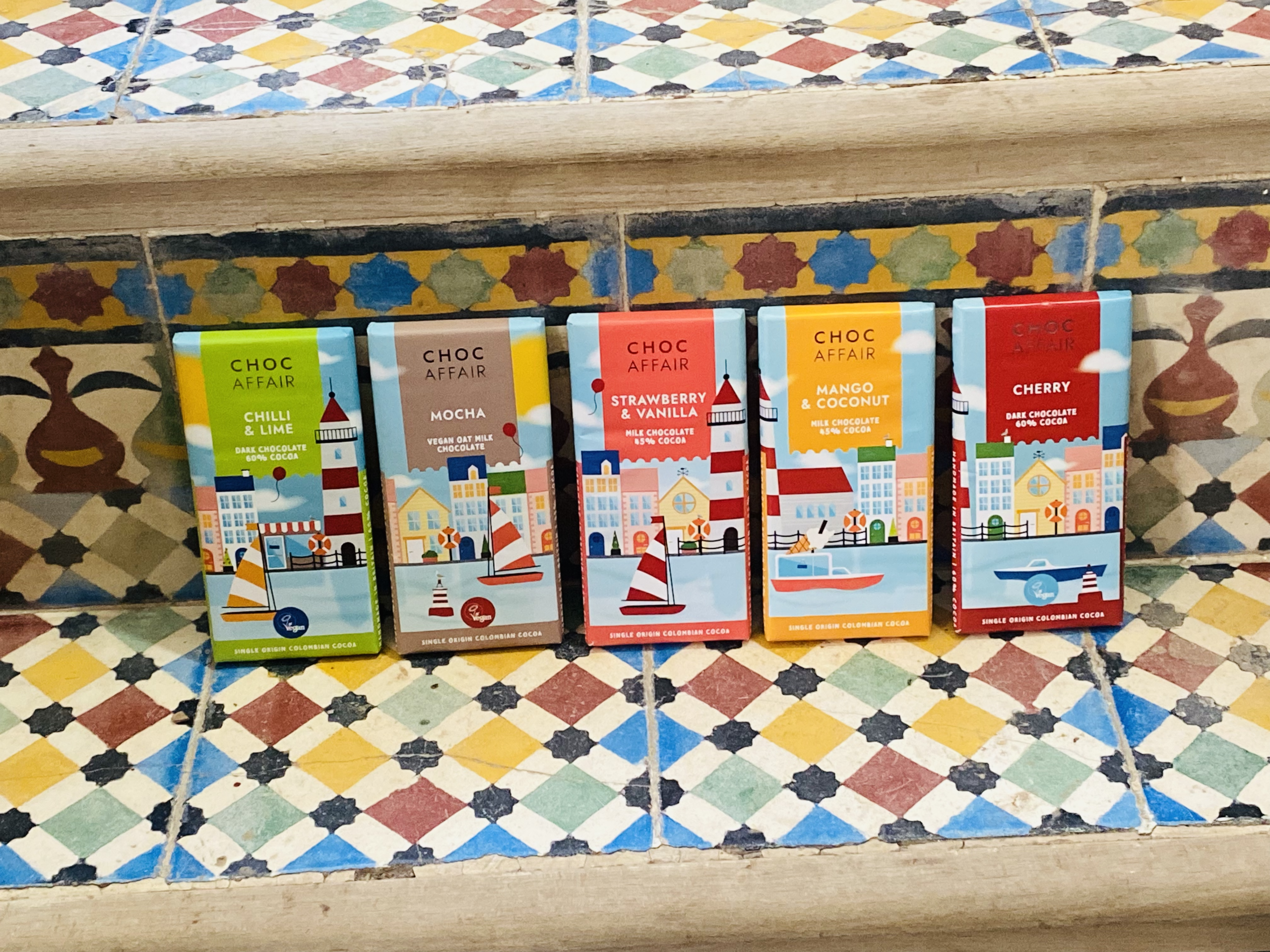 Limited Edition Summer chocolate bars on tiled background.